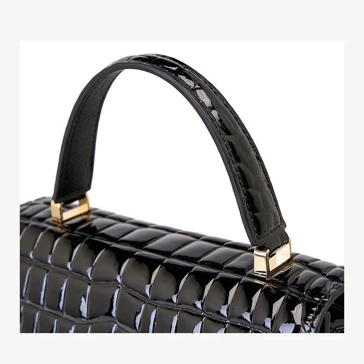 Crocodile effect trapeze leather handbag