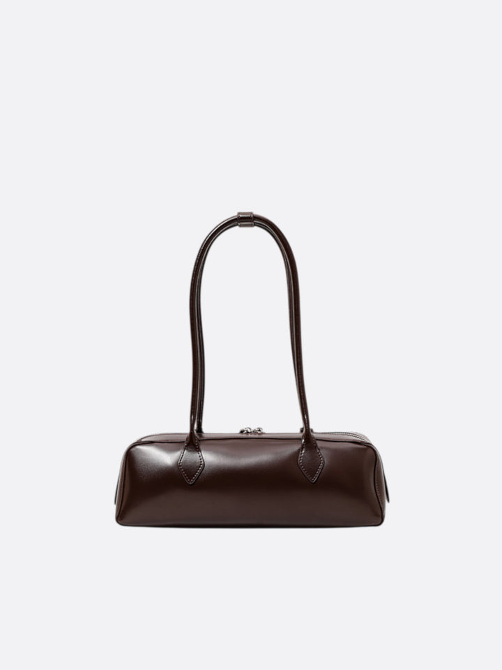 Elongated leather shoulder bag <br>Sésame