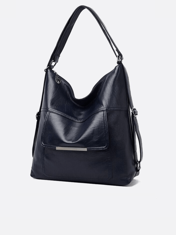 Sac cuir bleu marine transformable sac à dos