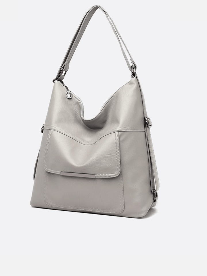 Sac cuir gris transformable sac à dos