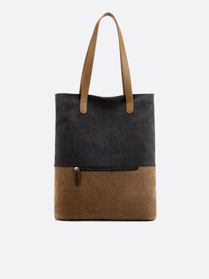 Sac toile noir porté épaule et dos
