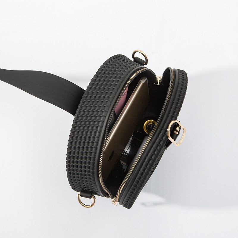 Round braided effect leather handbag
