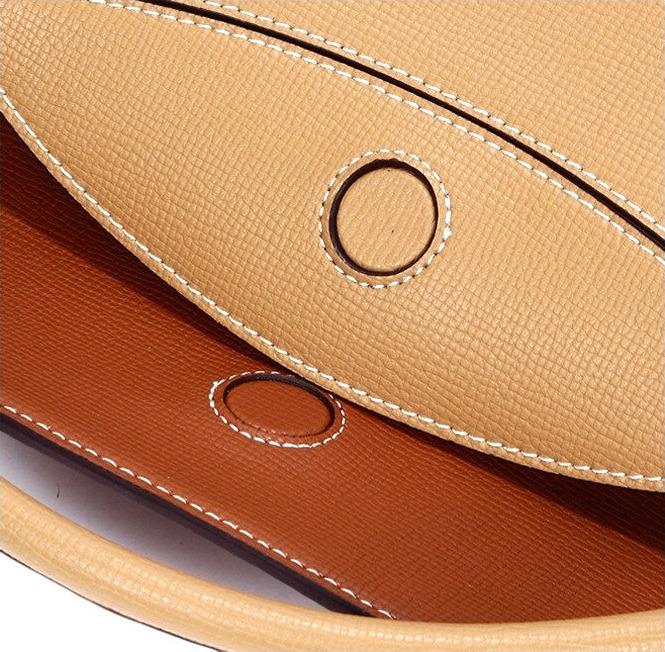 Two-tone leather half-moon handbag