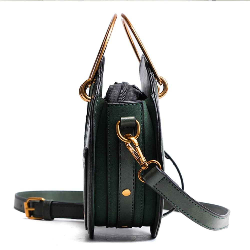 Round leather handbag with shoulder strap 