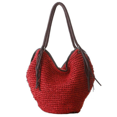 sac en paille avec pompon rouge